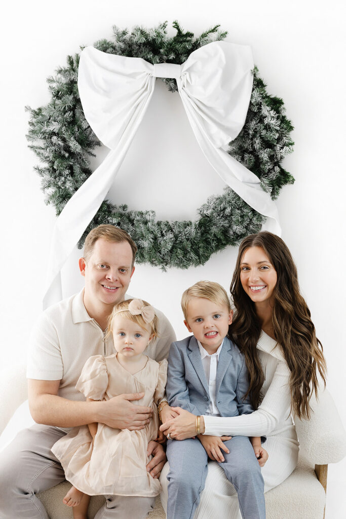 NYC holiday portraits of a family of four at Heirloom by Melissa's Flatiron District studio