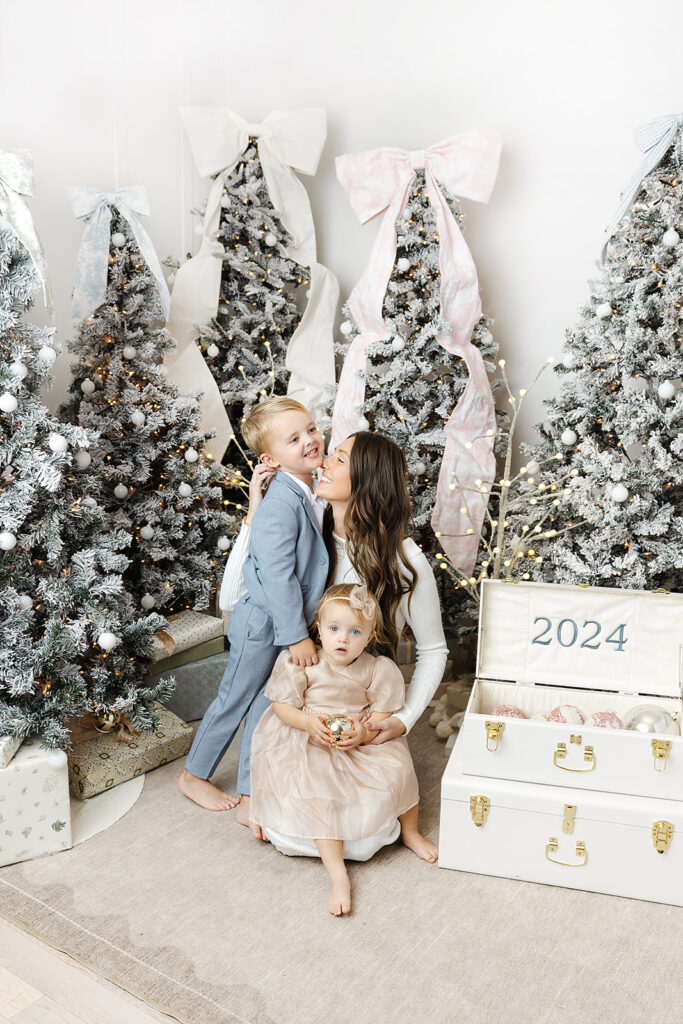 NYC holiday portraits, siblings in burgundy at Heirloom by Melissa, New York City