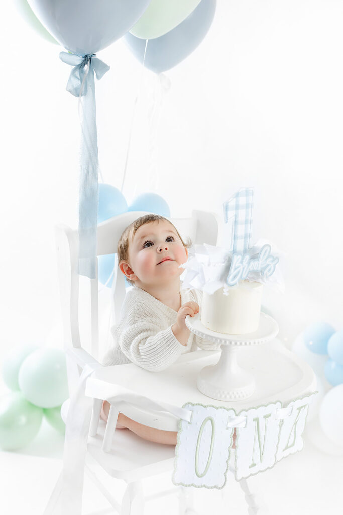 NYC first birthday photography, baby boy high chair birthday cake ONE banner balloons, Heirloom by Melissa Flatiron
