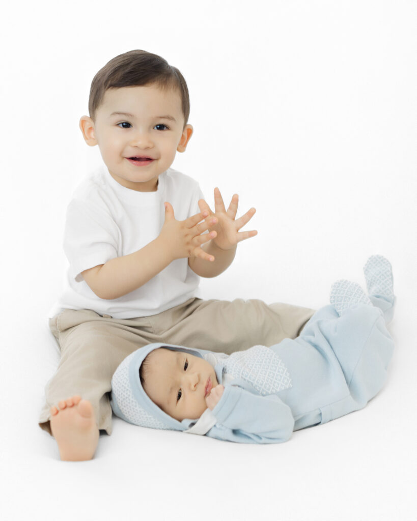 NYC studio newborn photographer sibling session baby Emilio