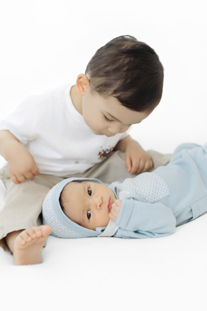 NYC studio newborn photographer sibling session baby Emilio