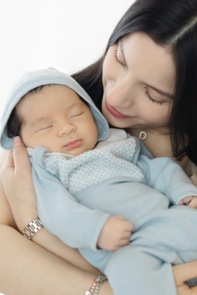 NYC studio newborn photographer mom and newborn portrait