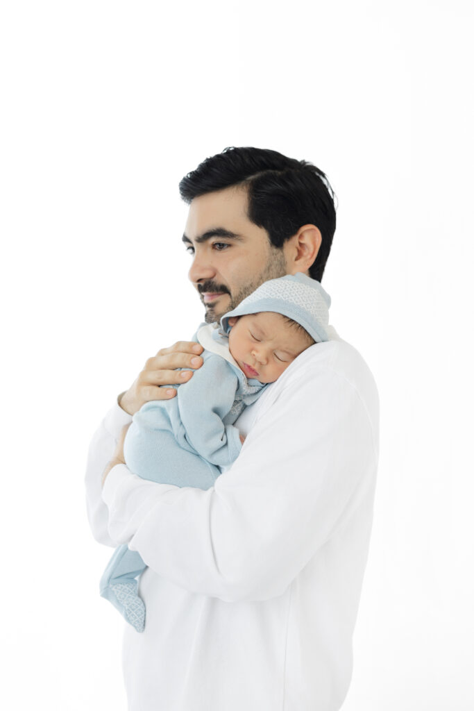 NYC studio newborn photographer dad and newborn portrait