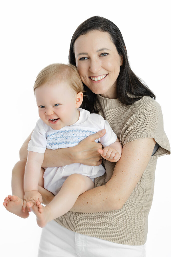 NYC first birthday photoshoot, mom holding laughing one year old, Heirloom by Melissa Photography