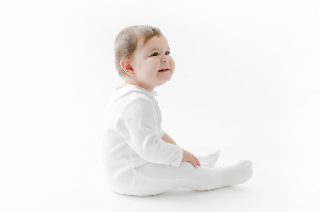 NYC first birthday photography, baby boy heirloom portrait smiling, Heirloom by Melissa Flatiron studio