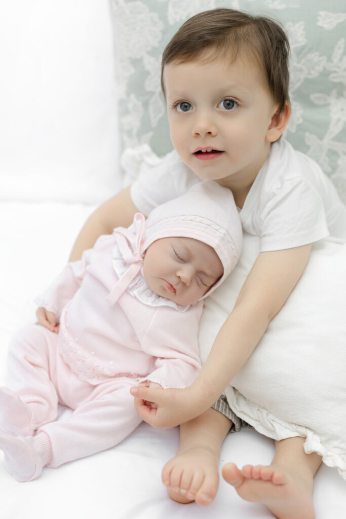 Two siblings, two Manhattan newborn sessions