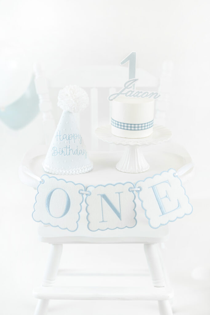 Baby boy in studio outfit before cake smash session, NYC cake smash photos, Heirloom by Melissa Photography