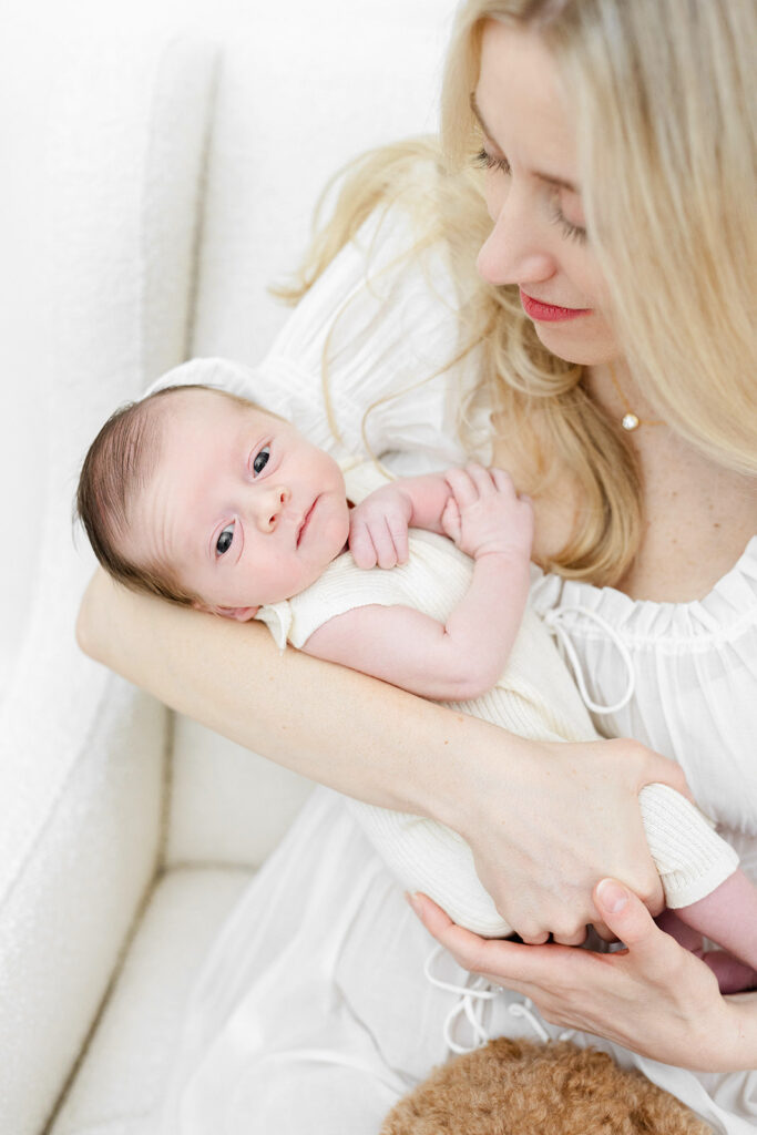Newborn baby boy looking up at parents, NYC baby photographer, Heirloom by Melissa Flatiron