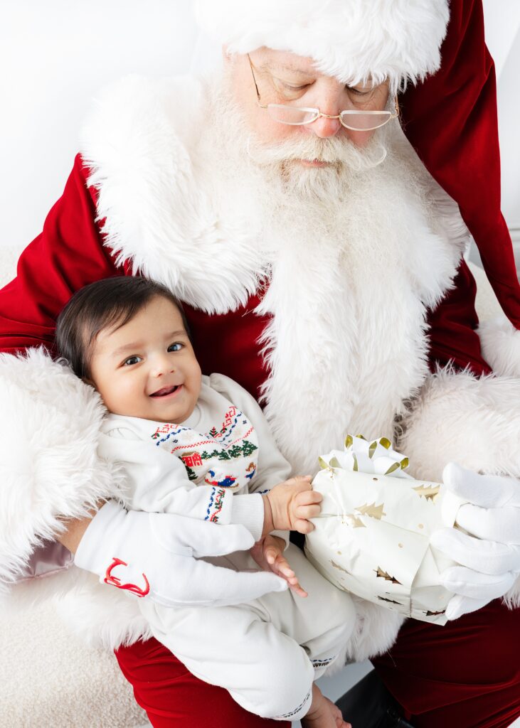 NYC Santa photos, boy in a cream cable knit sweater at Heirloom by Melissa, Manhattan