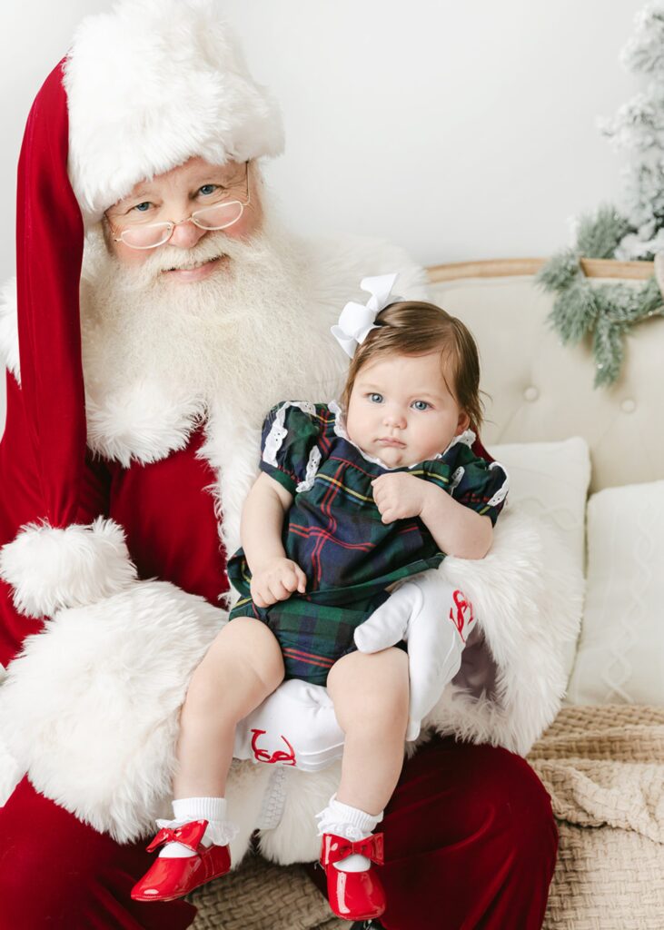 NYC Santa photos, two kids sitting with a private Santa on a white and gold set at Heirloom by Melissa, Manhattan