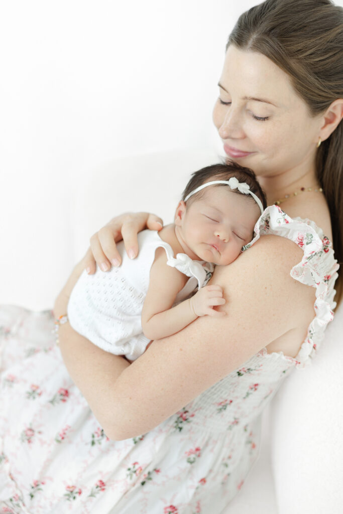 Mother holding newborn - Manhattan studio photography