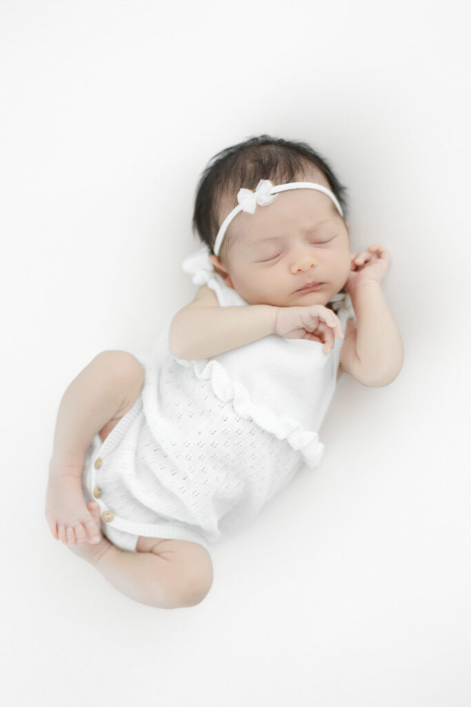 Newborn baby girl portrait - studio photography