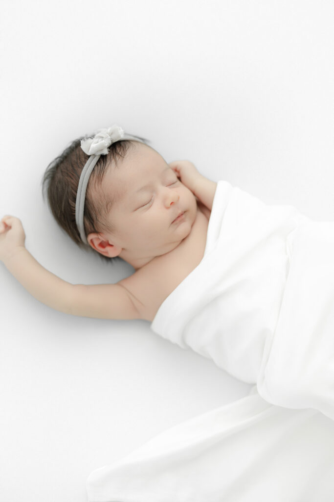 Sleeping newborn baby portrait - studio session