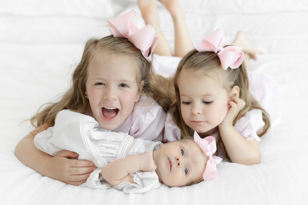 Three sisters documented at home by New York newborn photographer Heirloom by Melissa, NYC