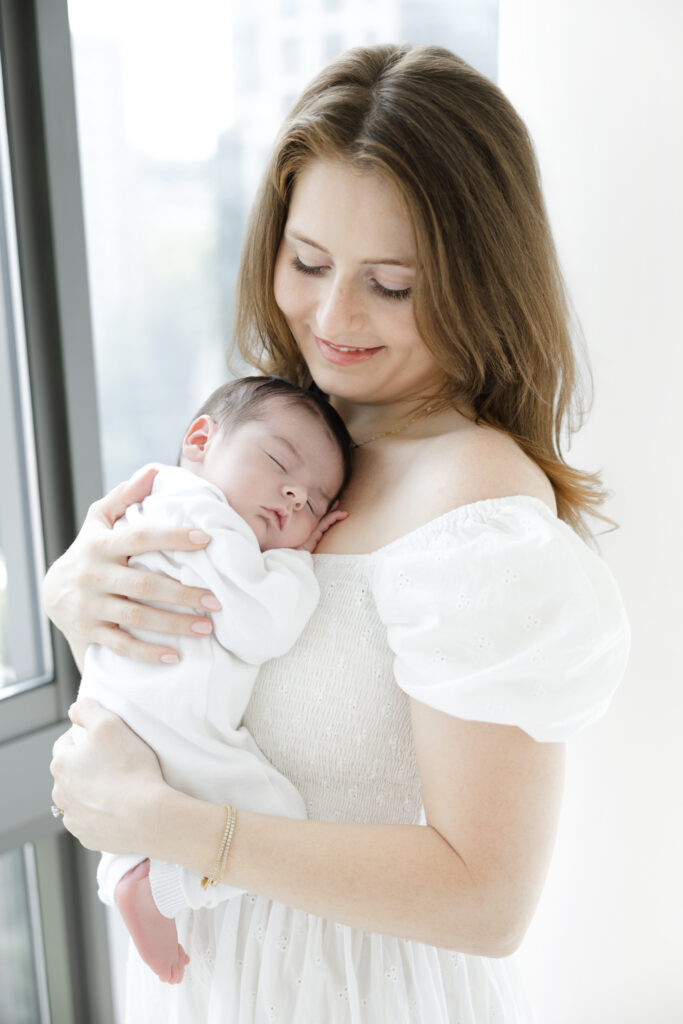 Newborn family portrait photographed at home in New York City