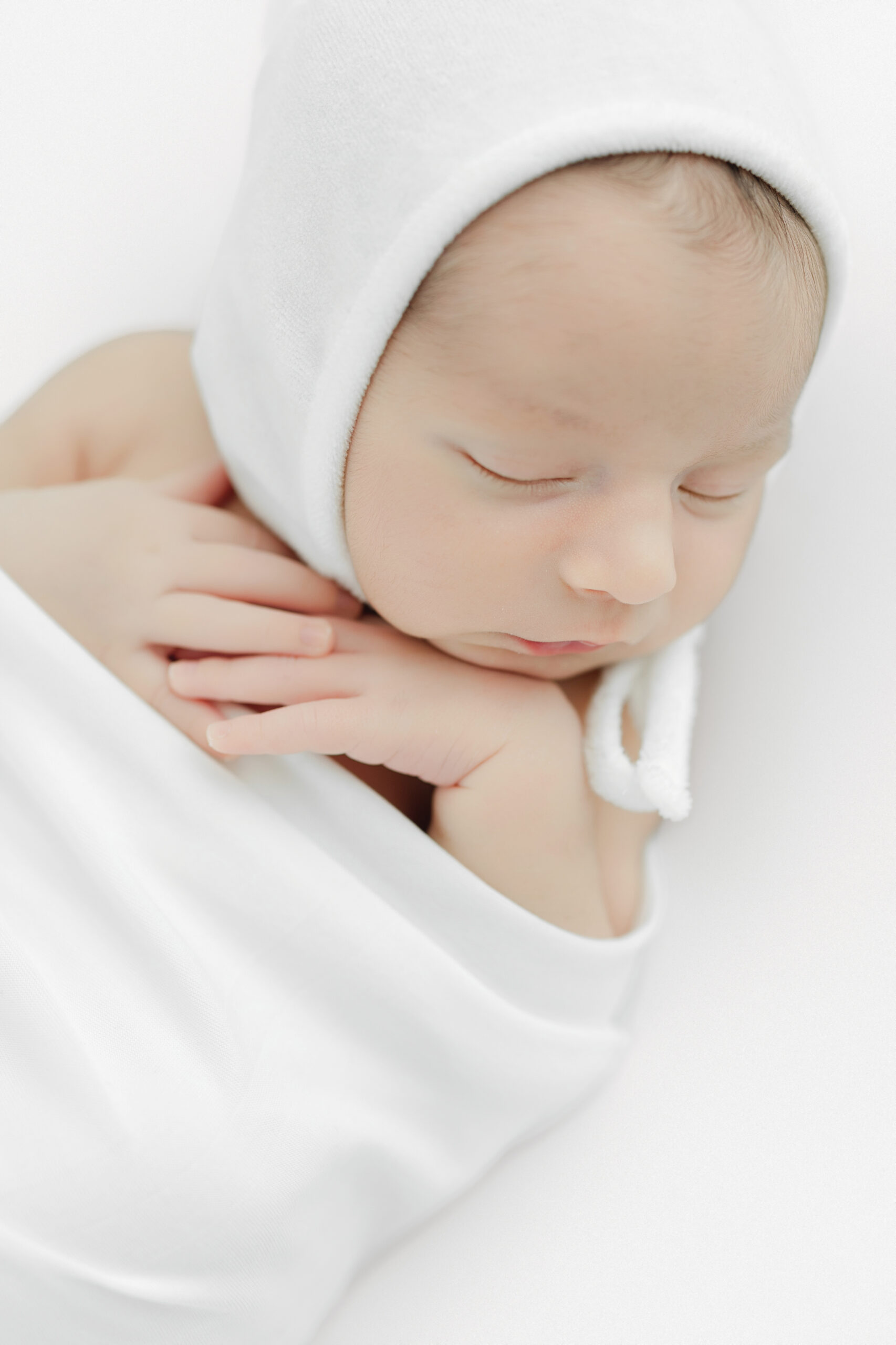 Sleeping baby boy in his newborn session