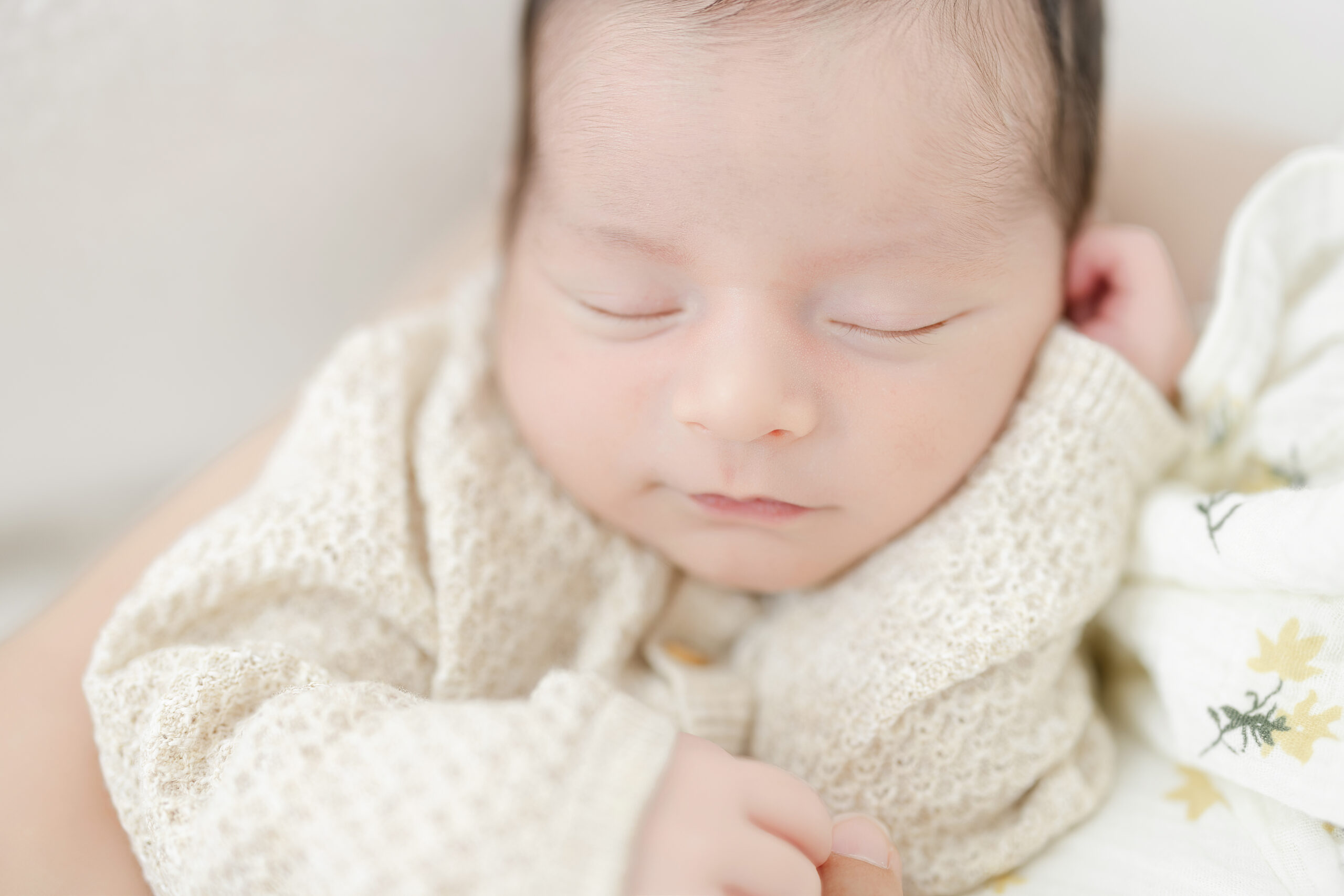 Close up newborn baby boy in his newborn session
