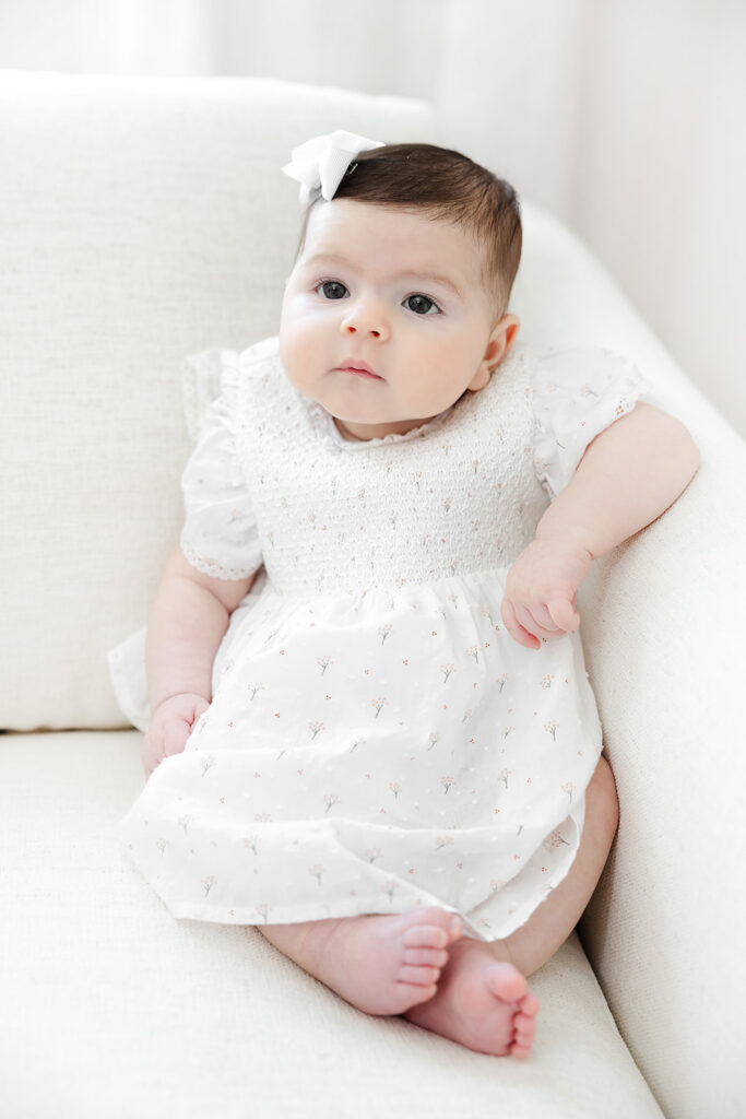 Close portrait of a three-month-old baby girl during an in-home session in Manhattan