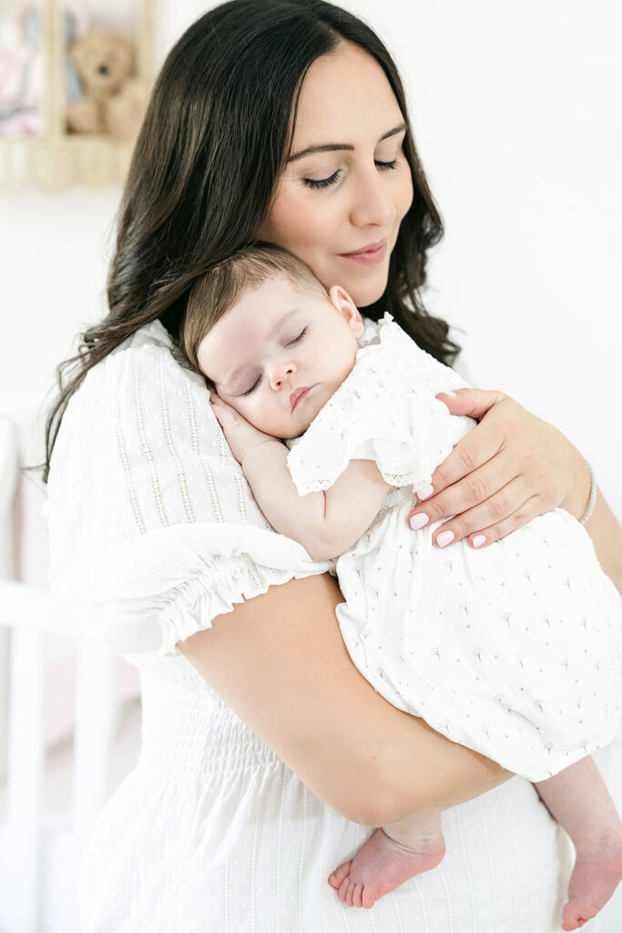 Close family portrait with Mom, Dad, and their three-month-old baby girl