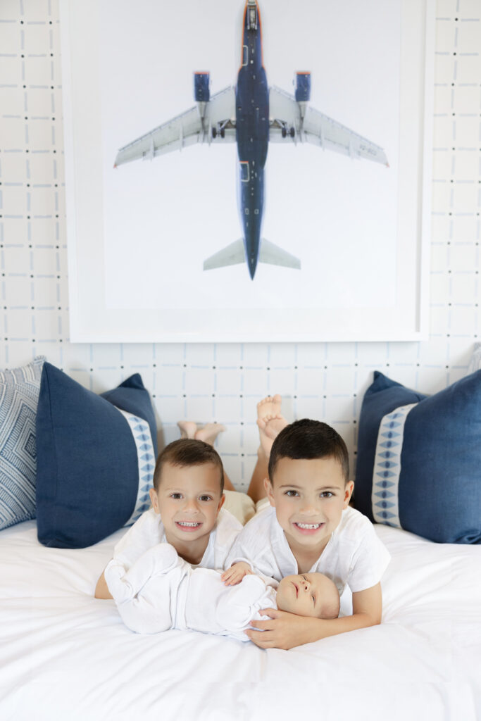 Tribeca newborn photography with two brothers and their baby brother