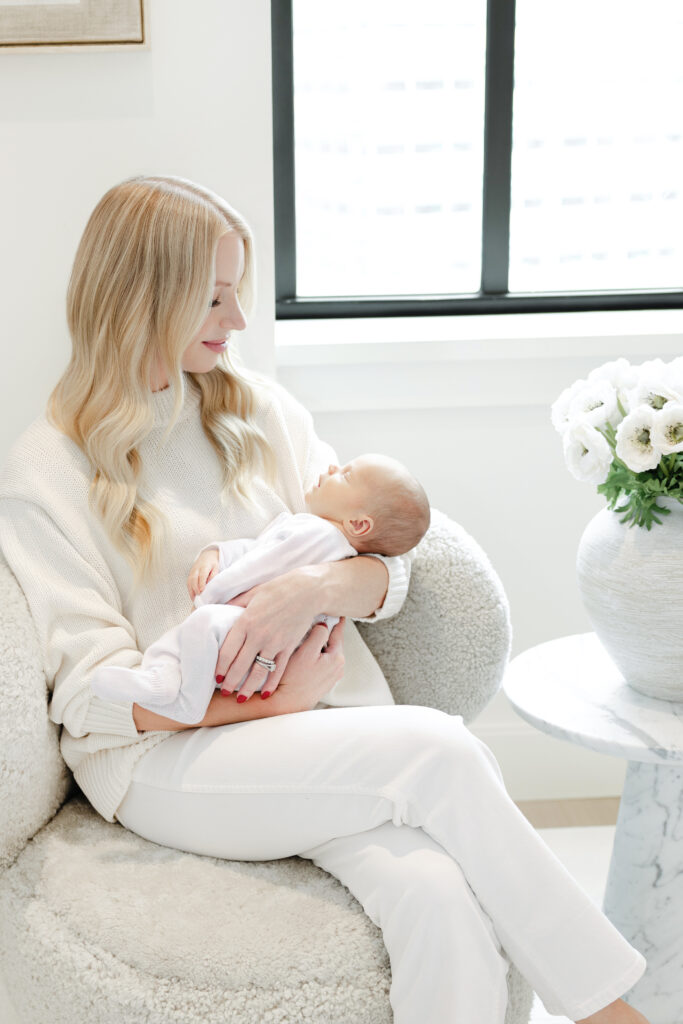 Mother holding her baby boy during a Tribeca newborn photography session