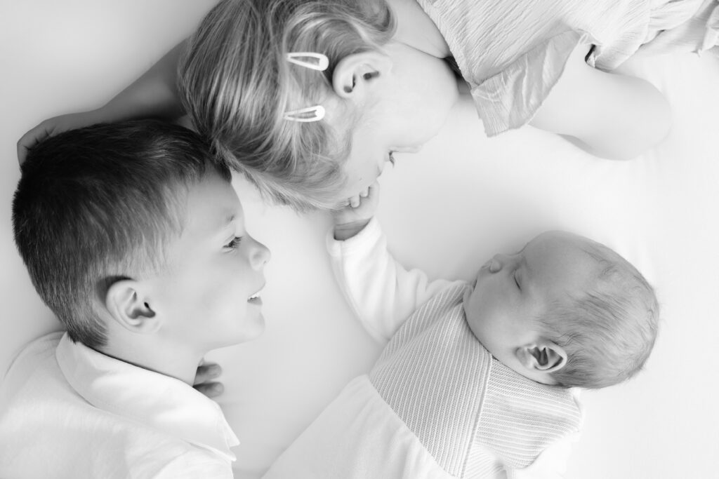 Natural sibling portrait during a newborn photography session