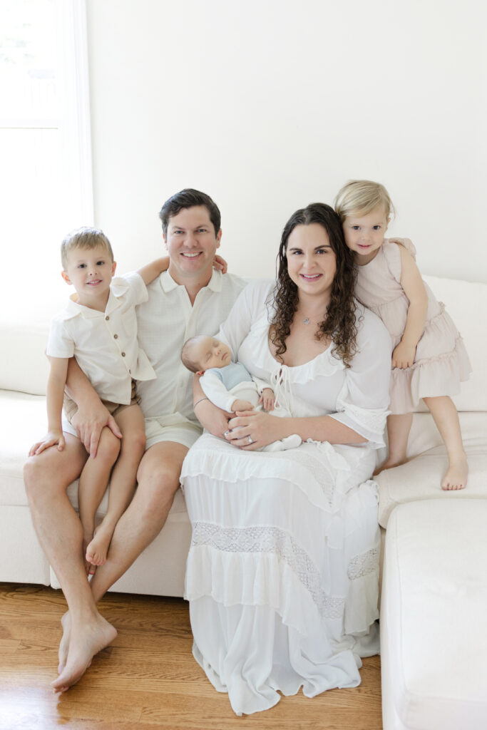 Family of five photographed in their Long Island home